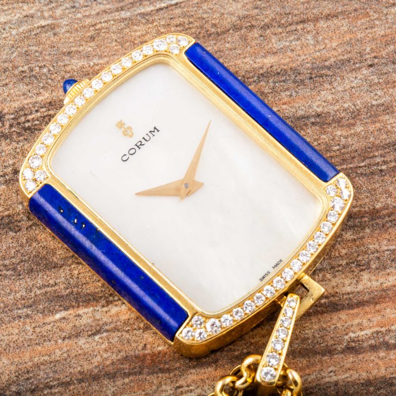 Corum YELLOW GOLD PENDANT WATCH WITH LAPIS LAZULI, MOTHER OF PEARL, DIAMONDS AND GOLD CHAIN