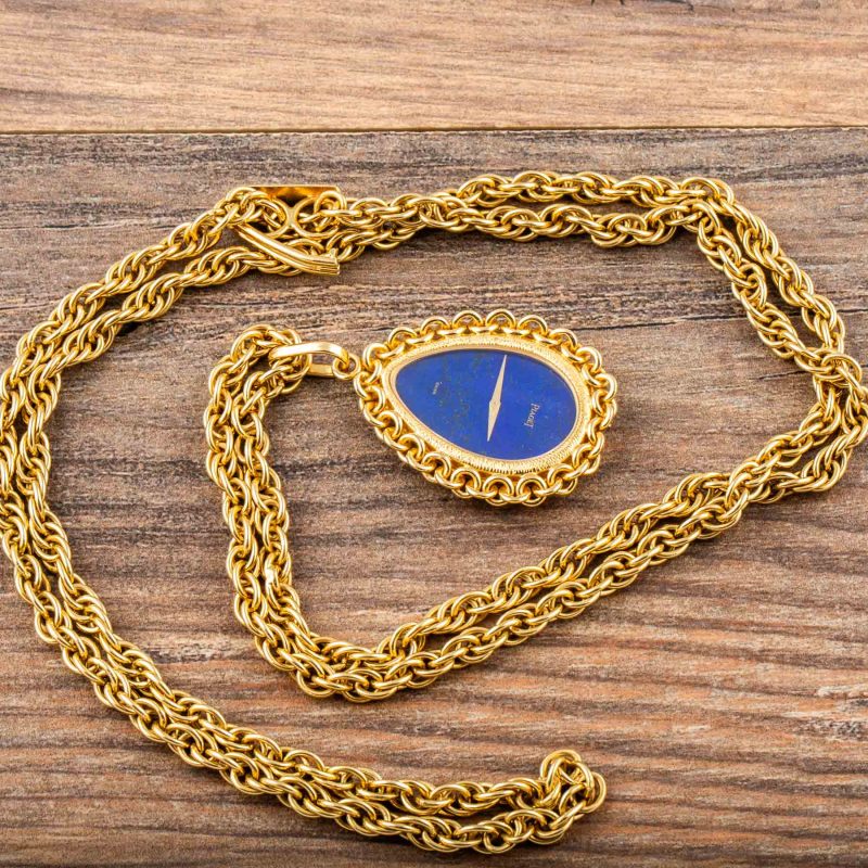 Piaget YELLOW GOLD AND LAPIS LAZULI PENDANT WATCH WITH ORIGINAL CHAIN