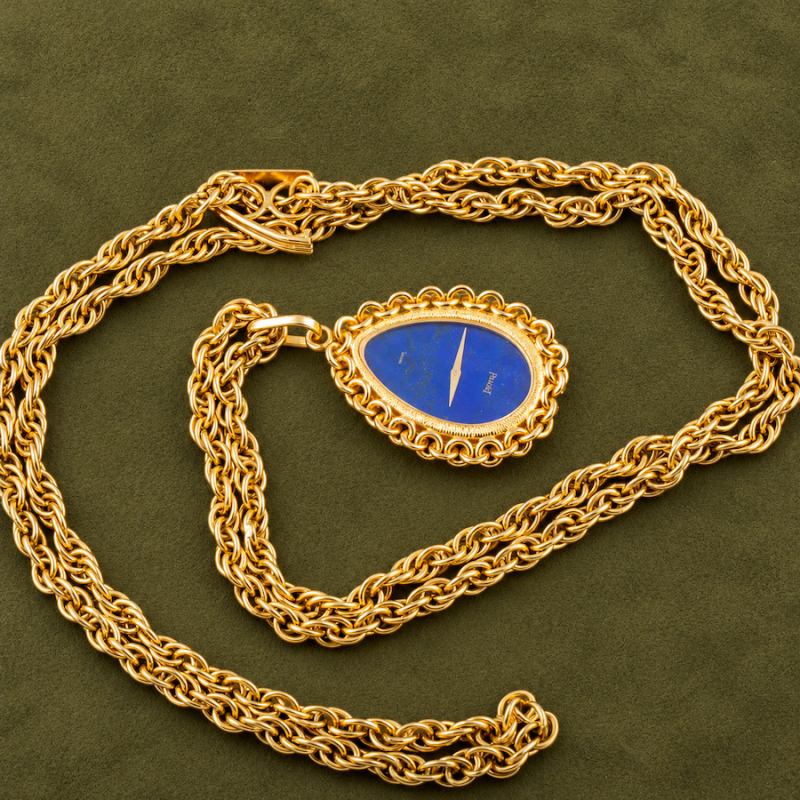 Piaget YELLOW GOLD AND LAPIS LAZULI PENDANT WATCH WITH ORIGINAL CHAIN