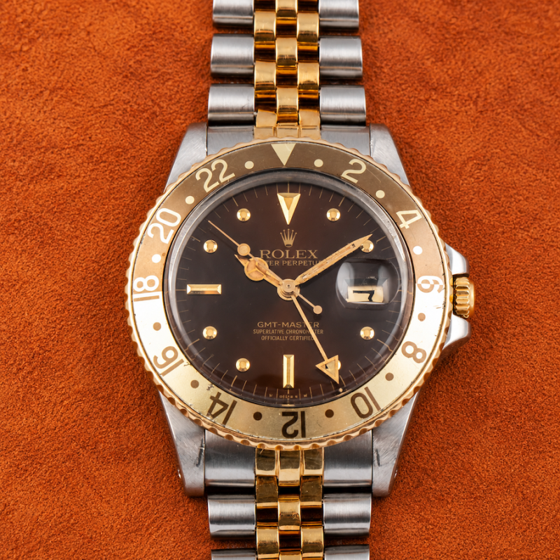 Rolex GMT MASTER REF. 16753 “ROOT BEER” STEEL AND YELLOW GOLD 